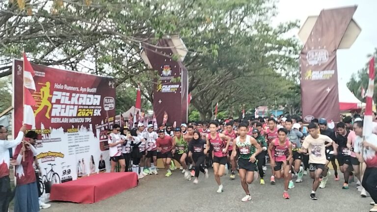 KPU Lutra Menyelenggarakan Event Pilkada Run 2024 Di Taman Siswa Masamba.