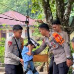 Trauma Healing Polri Hadirkan Flying Fox untuk Kembalikan Senyum Anak-Anak Terdampak Bencana di Kayu Pasak*